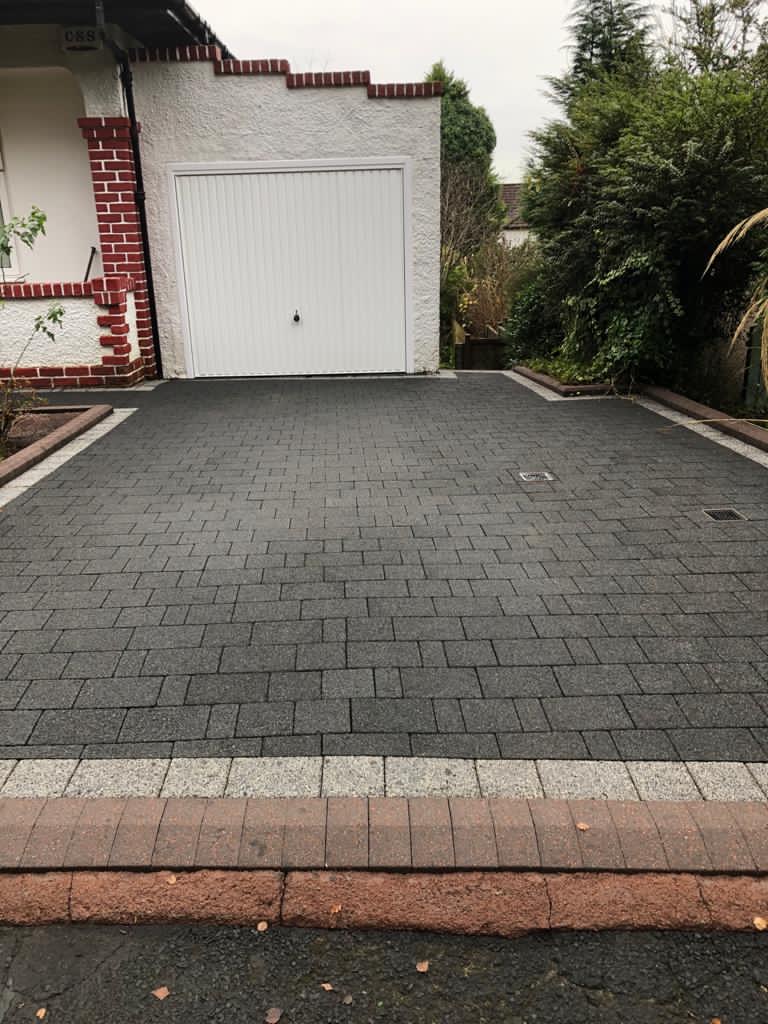 Driveway and garage area cleaned