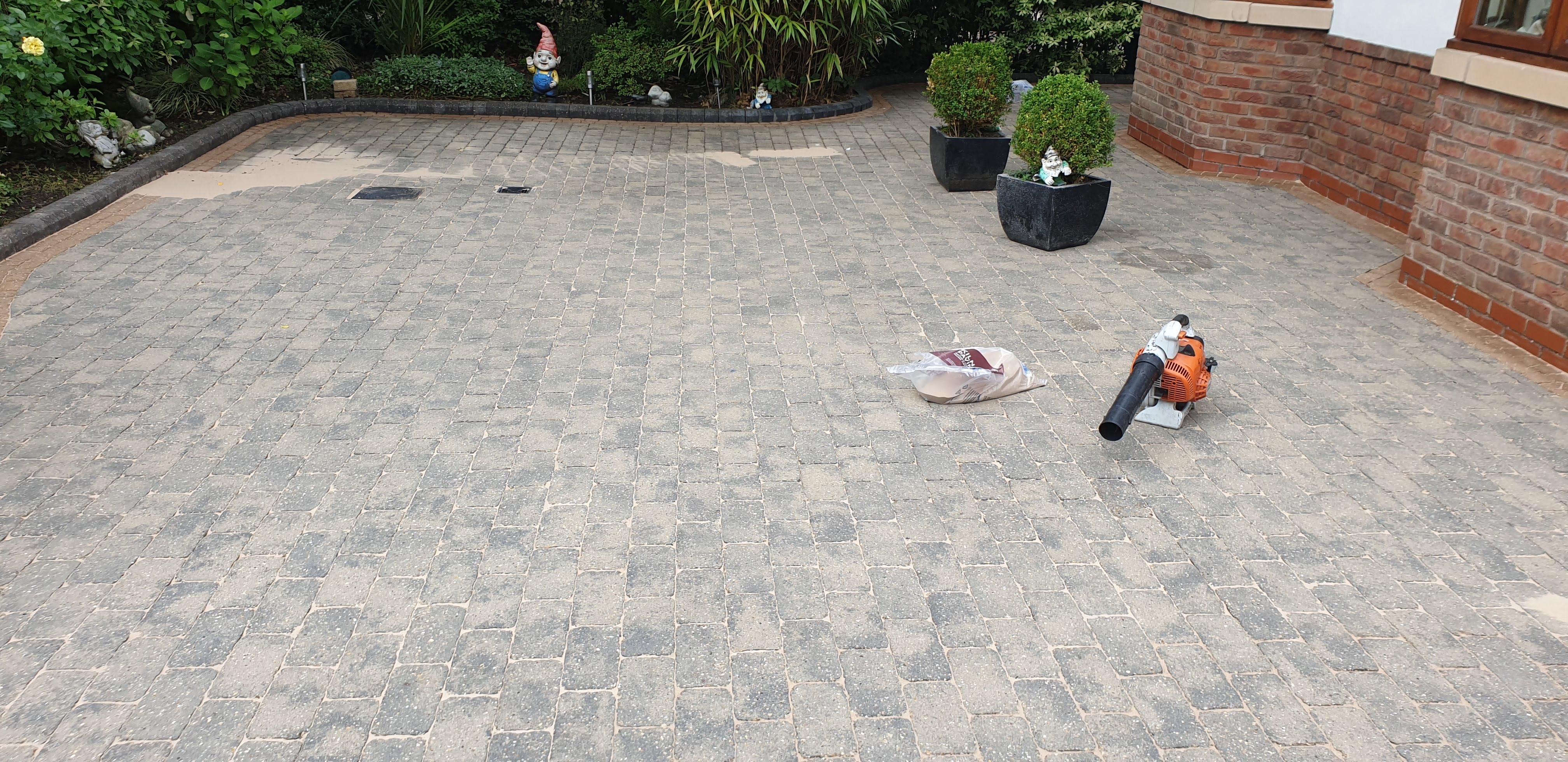 Driveway cleaning in progress