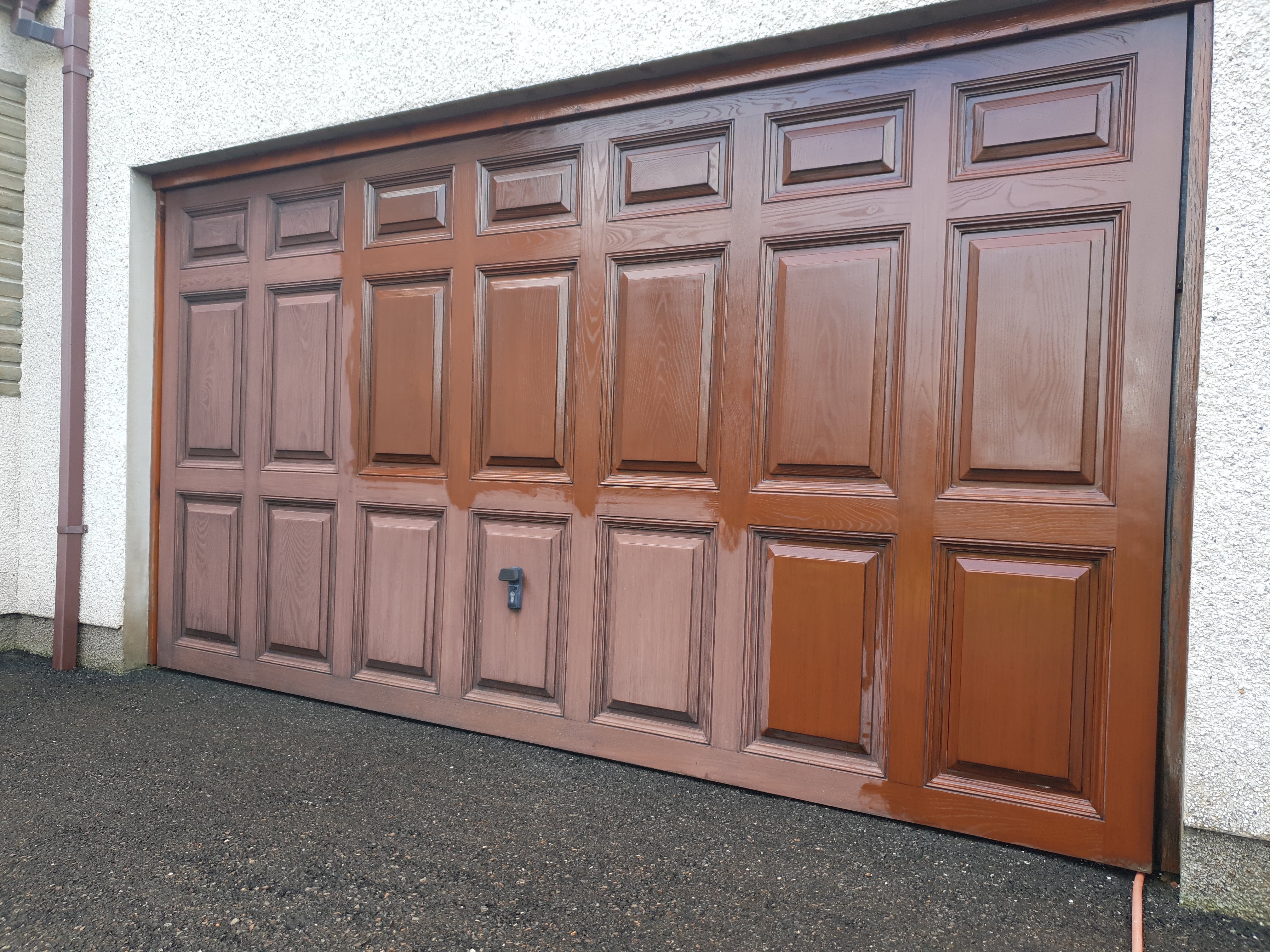 Garage door before and after cleaning