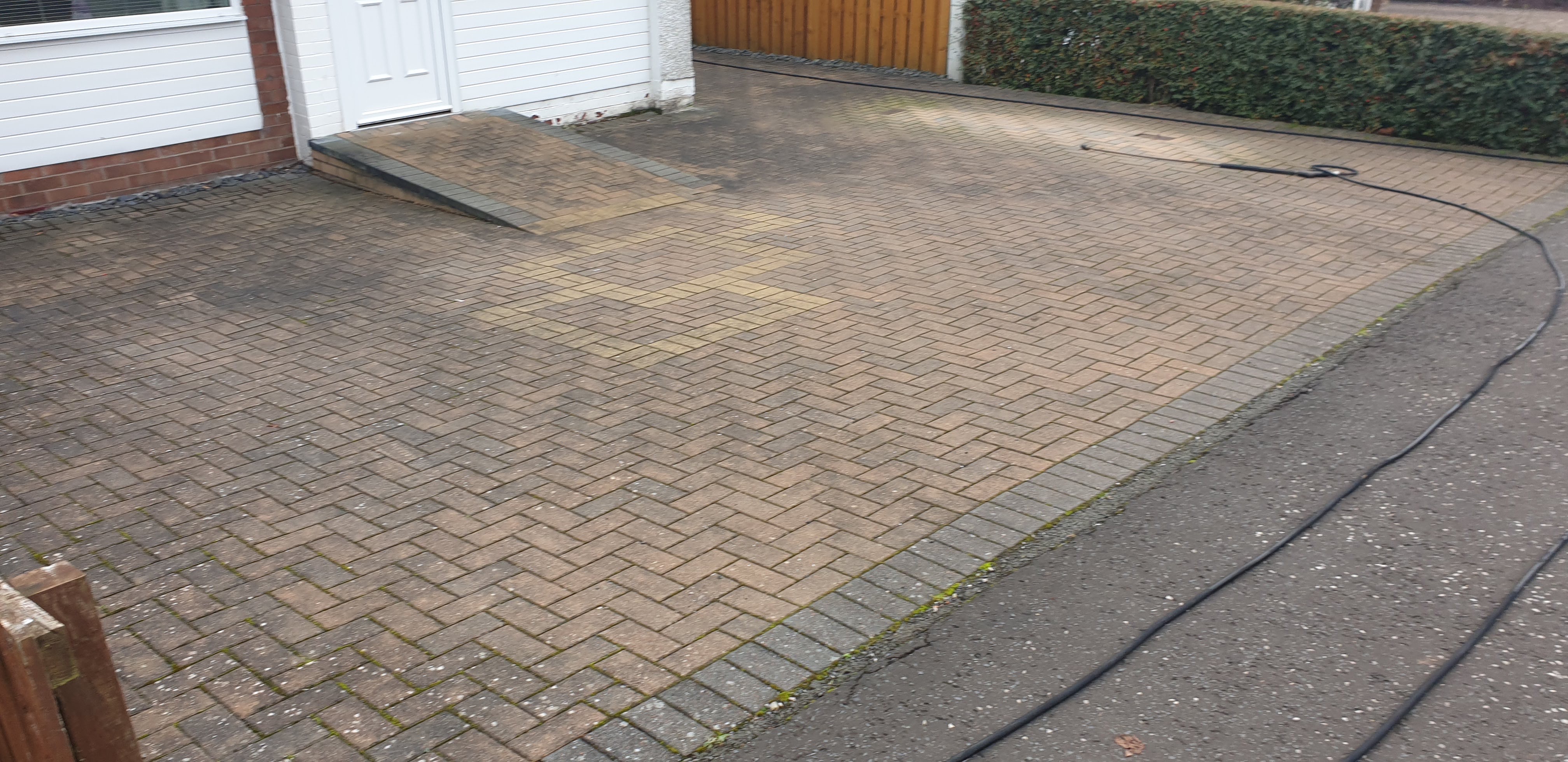 Block paving driveway before cleaning