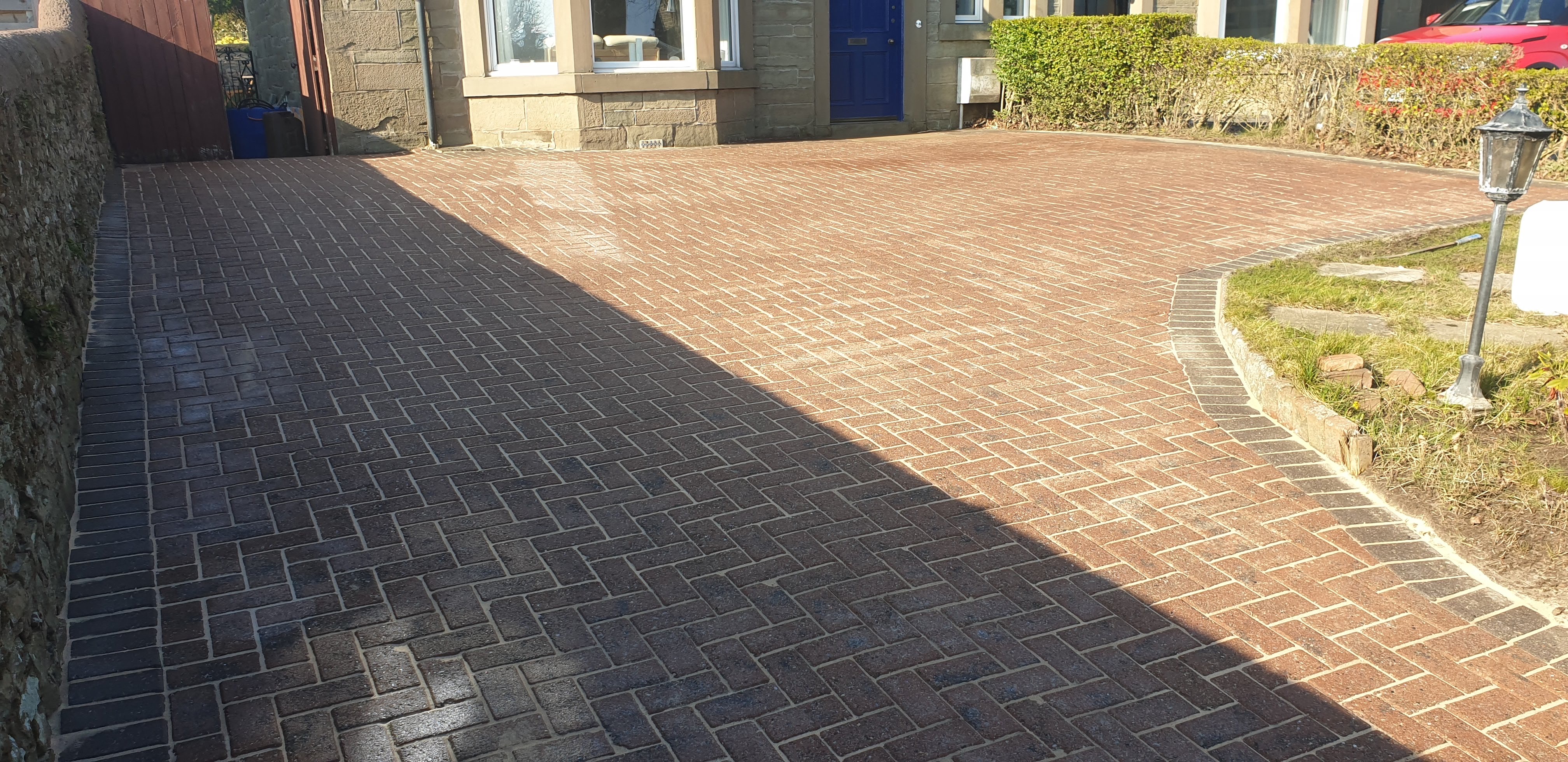 Block paving driveway half cleaned comparison