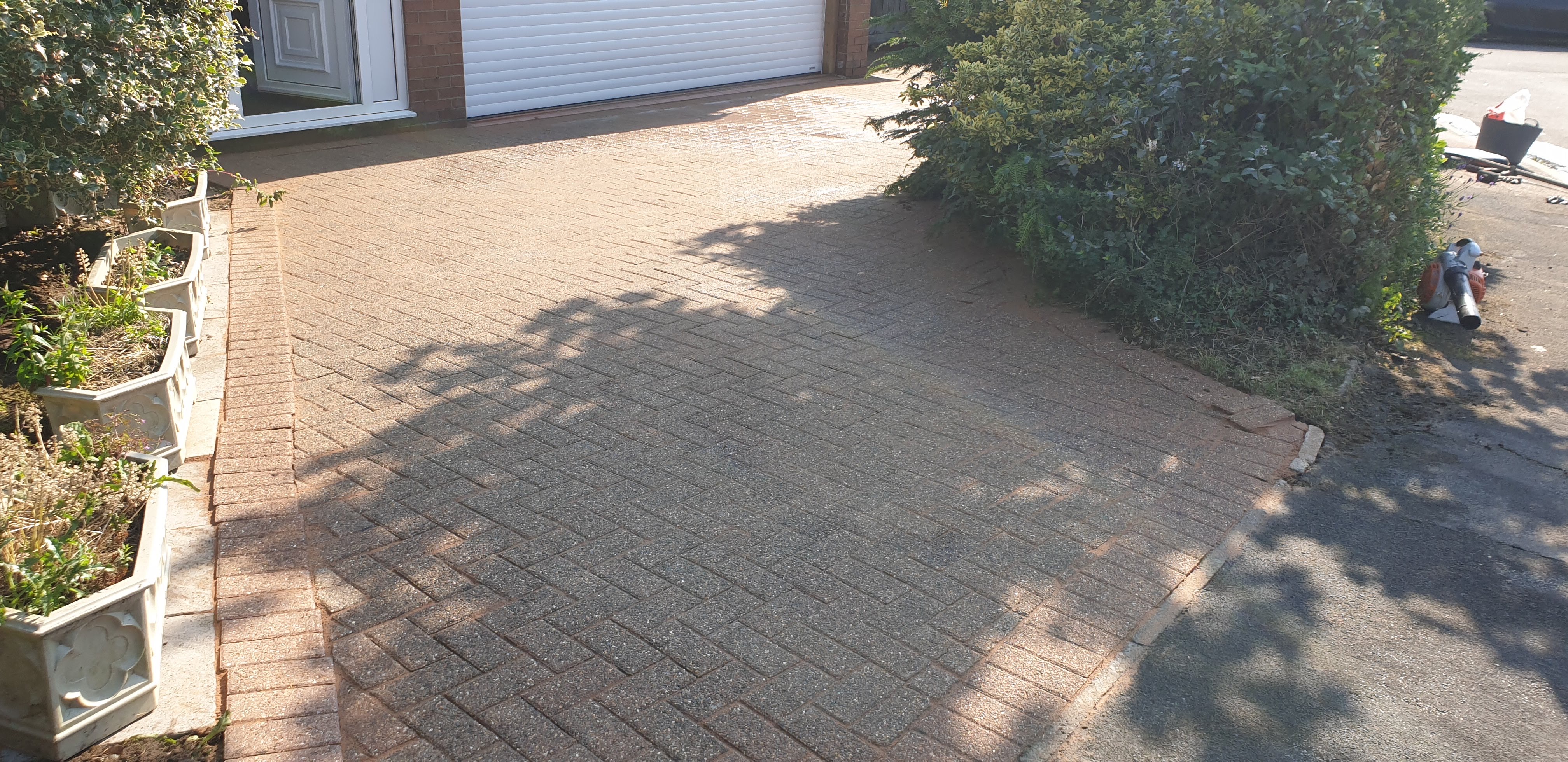 Driveway cleaning and sealing service